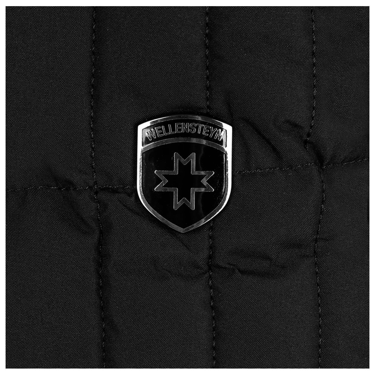 wellensteyn-jacke-centurionlady-black-detail Damen Jacke Centauri Lady von Wellensteyn in Schwarz, Detailansicht Logo