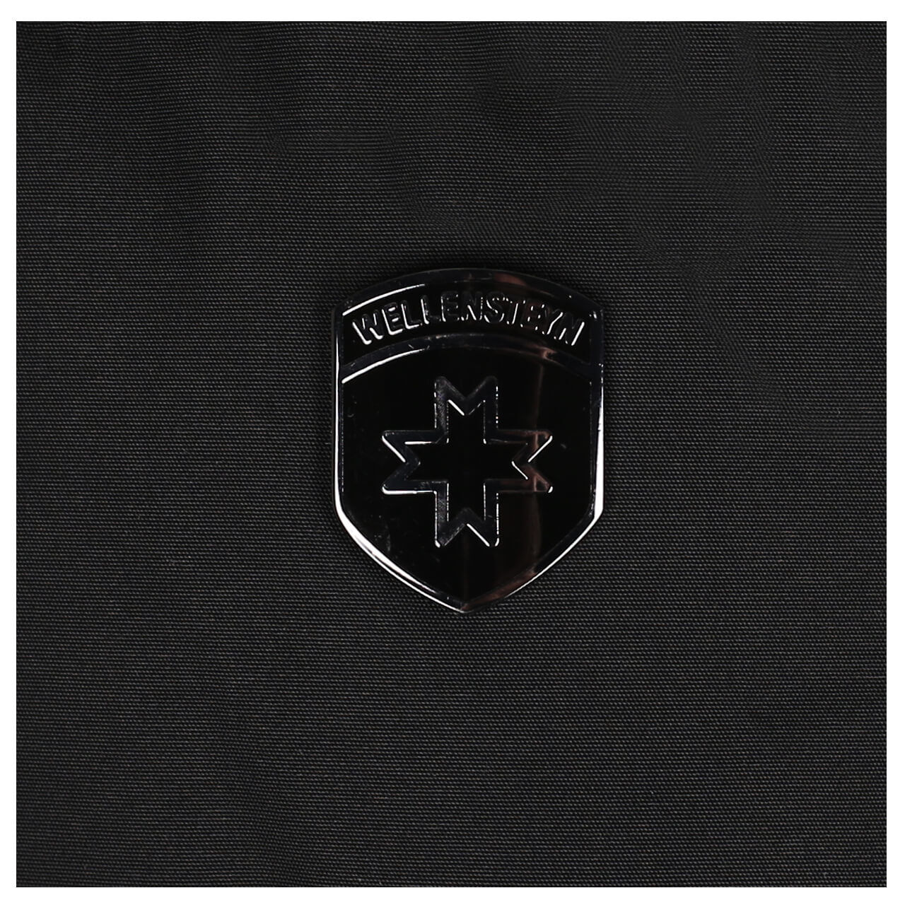 wellensteyn-leuchtfeuer-jacke-black-870-detail-logo Herren Jacke Leuchtcraft Blouson von Wellensteyn in Schwarz, Logo