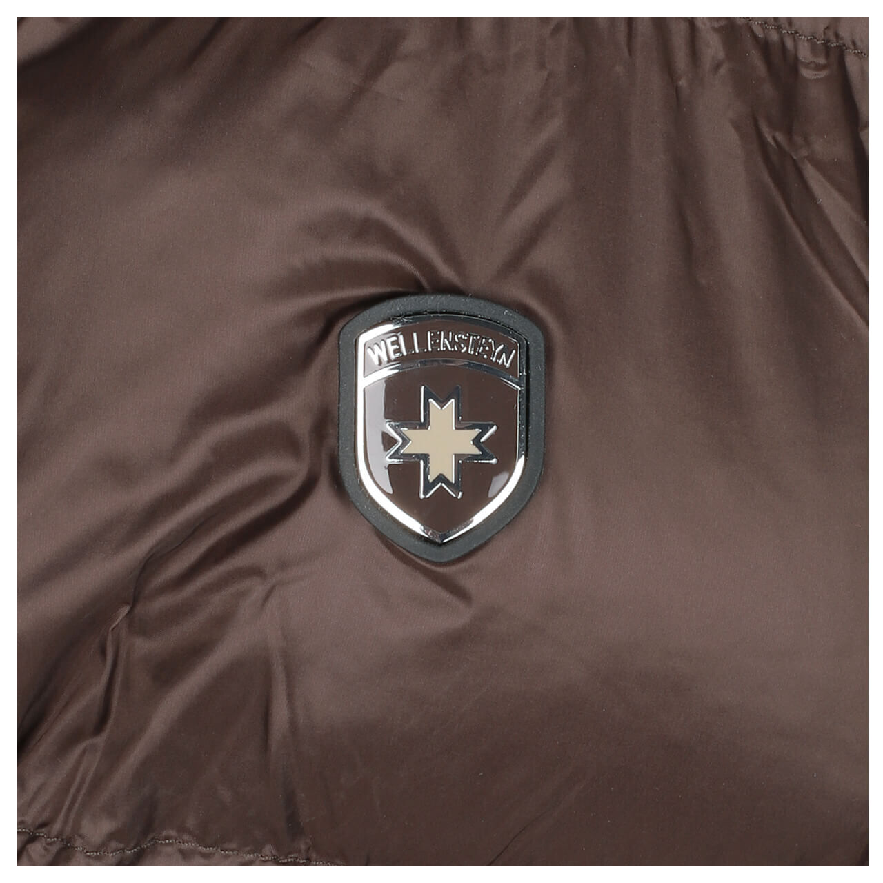 Damen Jacke Goldmine Extra Long von Wellensteyn in Dunkelbraun, Detailansicht Logo
