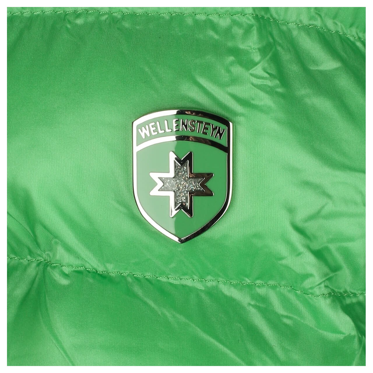 Damen Jacke Italy Hood von Wellensteyn in Grasgrün, Detailbild vom Logo